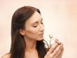 woman smelling perfume