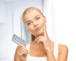 young woman with pills