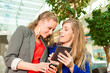 Foto: Two women shopping with bags in mall Two women shopping with bags in mall