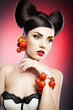 Portrait of sensual woman model with luxury makeup with tomatoes