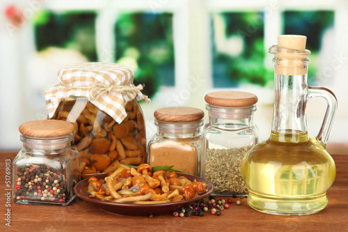 Photo: Composition of delicious marinated mushrooms, oil and spices Composition of delicious marinated mushrooms, oil and spices