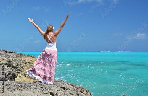 Photo: Girl on the rock looking to Atlantic. Little Exuma, Bahamas Girl on the rock looking to Atlantic. Little Exuma, Bahamas