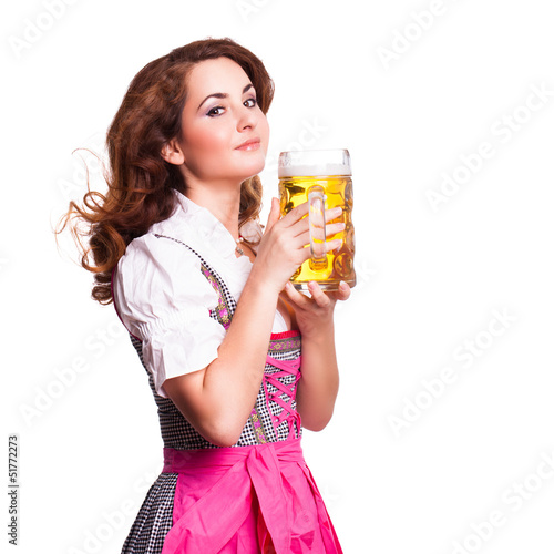 Photo: attraktive junge Frau im Dirndl mit Bierkrug attraktive junge Frau im Dirndl mit Bierkrug