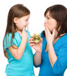 Little girl and her mother are anxious about time