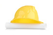 yellow helmet and roll paper