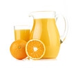 Jug, glass of orange juice and orange fruits