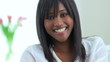 Happy black woman looking at camera