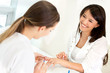 Woman getting her nails done