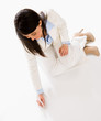 Business woman writing on the floor