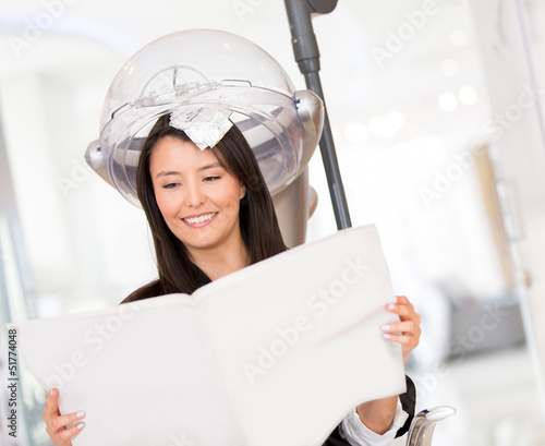 Photo: Woman dying her hair Woman dying her hair