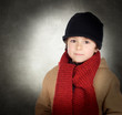 Beautiful child with scarf and wool hat