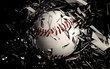 baseball breaking glass against a black background.