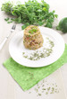 Brown rice with green peas and prosciutto