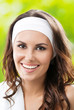 Photo: Young woman in fitness wear, outdoors Young woman in fitness wear, outdoors