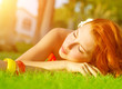 Cute female on green grass