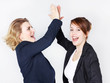 Two business women presenting teamwork