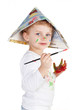 Cute boy is painting