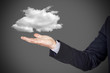 Photo: businessman with cloud over hand businessman with cloud over hand