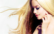 Beauty Blond Girl With Long Healthy Blowing Hair