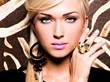 beautiful face of young woman with fashion makeup