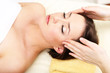 Beautiful young woman in cosmetic salon close up