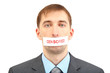 Young businessman with a band on his mouth isolated on white