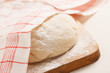 Photo : Dough on wooden board Dough on wooden board