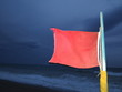 storming flag sea wind