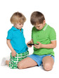 Two children plaing with smartphone