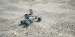scientific robot moving on alien desert soil 3d illustration