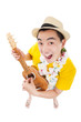 young man playing ukulele and singing