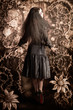 Photo: Fairy tale girl walking through secret garden Fairy tale girl walking through secret garden