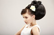 Vogue Style. Classy Woman with Trendy Hairstyle. Allure