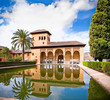 Photo: Alhambra palace reflected in water in Granada. Spain. Alhambra palace reflected in water in Granada. Spain.