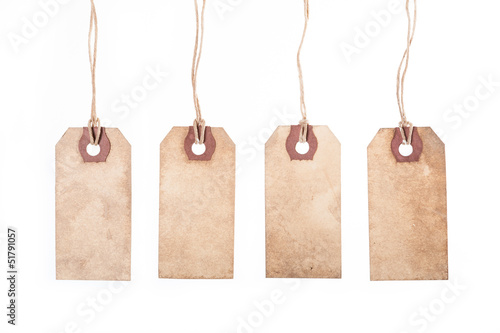 Photo: Assortment of vintage tags and labels. Assortment of vintage tags and labels.