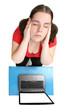 An student with headache during exams. Bird eye view.
