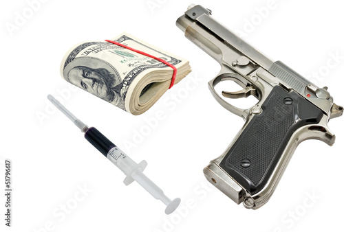 Photo: Pistol, money and syringe Pistol, money and syringe