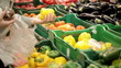 Video: Woman in a supermarket at the vegetable shelf. Woman in a supermarket at the vegetable shelf.