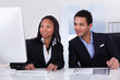 Two Business People In Office