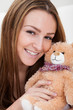 Foto: Young Woman Sleeping With Teddy Bear Young Woman Sleeping With Teddy Bear