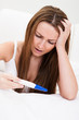Foto: Woman Checking Pregnancy Test Woman Checking Pregnancy Test
