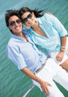 Summer couple in a boat