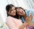 Girls using app on smart phone