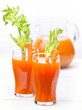 Fresh carrot and pumpkin juice on white background