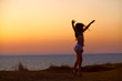 silhouette with arms raised