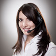 Foto: Friendly beautiful call centre operator Friendly beautiful call centre operator