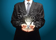 light bulb with drawing business plan in hand