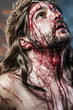 Foto: calvary jesus, man bleeding, representation of passion with blue calvary jesus, man bleeding, representation of passion with blue