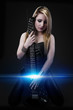 beautiful blonde in black leather jacket, playing an electric gu