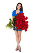 Brunette woman with a big bouquet of red roses